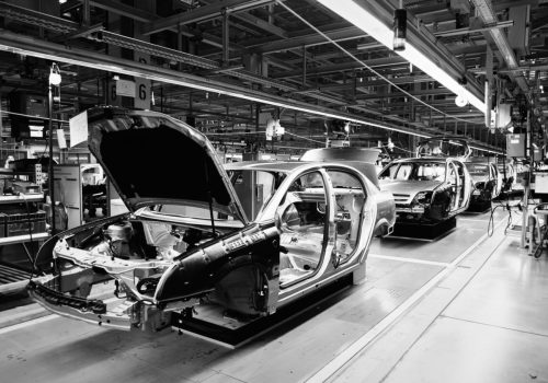 unfinished automobiles in a car plant