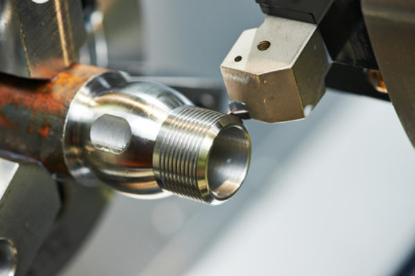 milling detail on metal cutting machine tool at factory